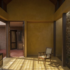 Ochre walls and flooring in entrce courtyard